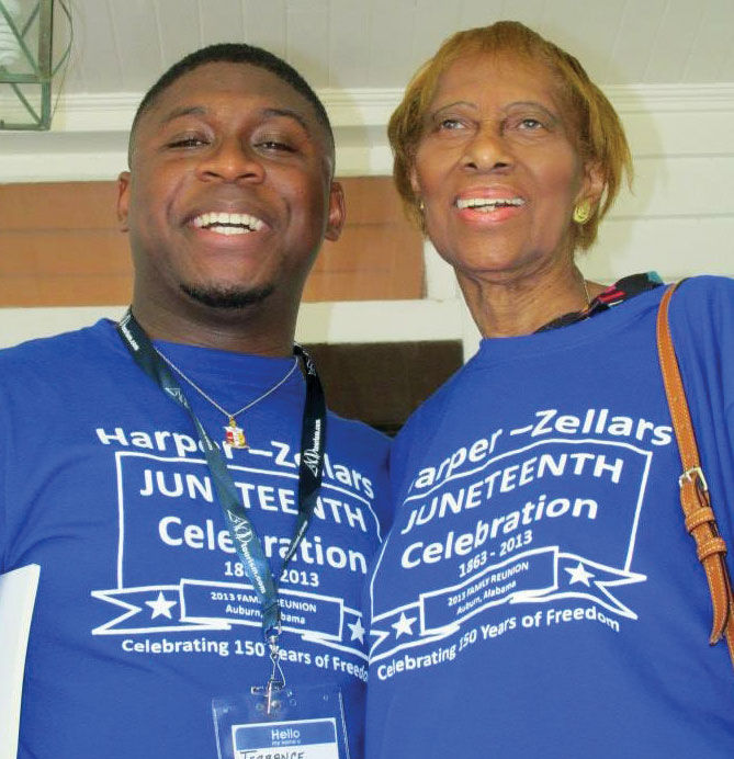 Terrance poses with a relative at a family reunion